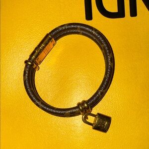 Luxury Louis Vuitton Brown Bracelet with Locket Gold Accents